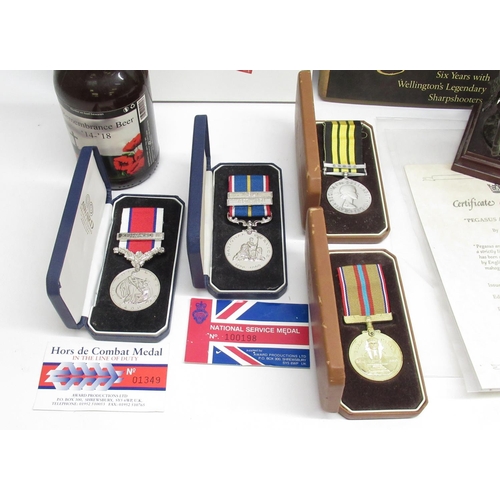 286 - Four Award Productions Medals for the National Service Medal, Hors de Combat Medal, Suez Canal, Afri... 