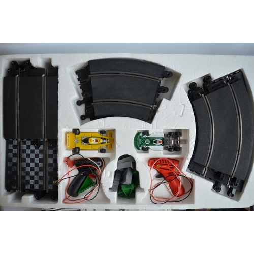 921 - Collection of Scalextric sets, cars and track to include C658 F1 set (missing power control unit) an... 