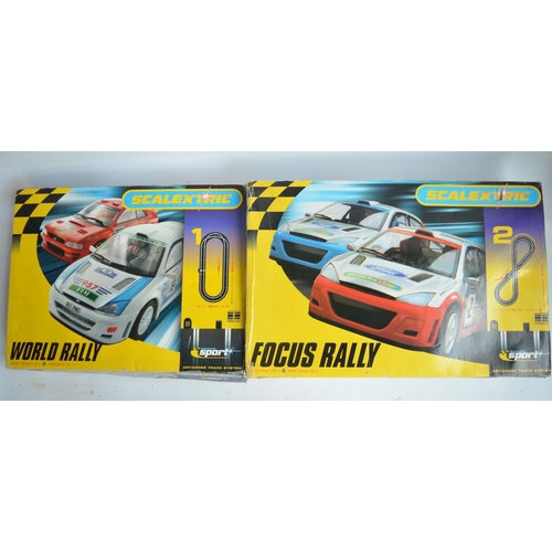 642 - Two boxed Scalextric slot car racing sets to include C1096 Ford Focus Rally and C1129 World Rally. B... 