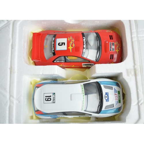 642 - Two boxed Scalextric slot car racing sets to include C1096 Ford Focus Rally and C1129 World Rally. B... 