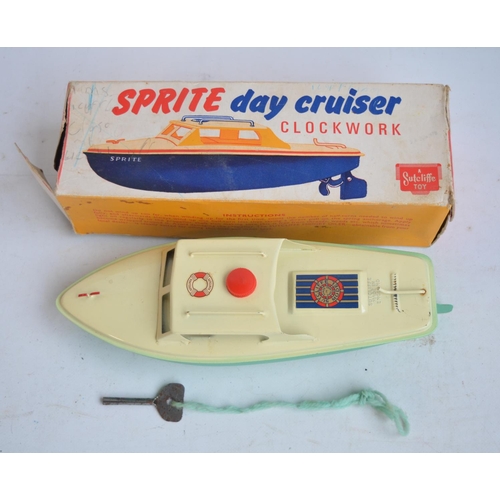 649 - Sutcliffe Toys Sprite Day Cruiser clockwork metal boat with key and in full working order. Boat in e... 