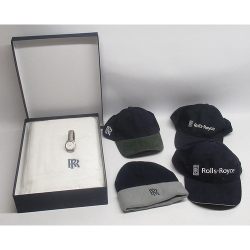 272 - Three Rolls-Royce baseball caps, a Rolls-Royce beanie, a Rolls-Royce towel in original packaging and... 