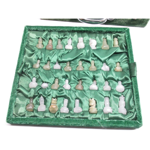 60 - Cased green and milky-white chess set with circular board, and a cased Mahjong set (2)