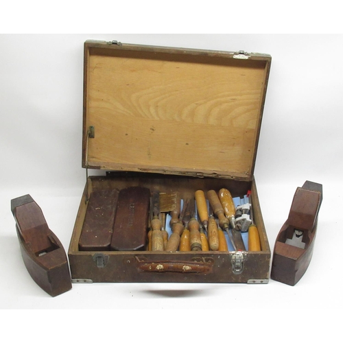 406 - Two vintage smoothing planes, two similar period cased sharpening stones and woodworking chisels