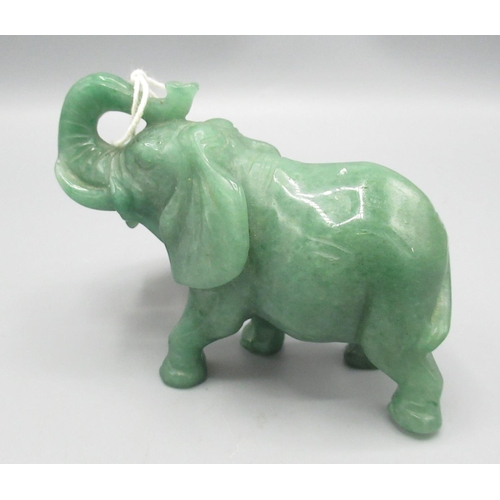 425 - C20th carved green hardstone elephant H7.5cm