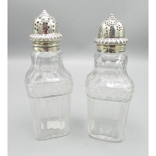 426 - Early C19th pair of pressed glass pepperettes with silver tops H14cm