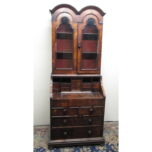 174 - Small Queen Anne style herring banded walnut bureau bookcase, with double arched top and two glazed ... 