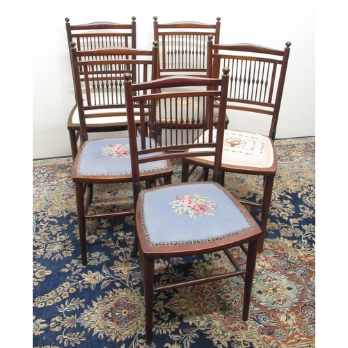 319 - Set of five Edwardian mahogany Salon chairs, with spindle backs and woolwork seats on turned support... 