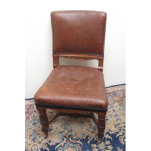 331 - Victorian oak and ebonised side chair, with nailed leather seat and back on fluted supports with ope... 