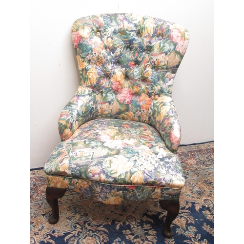 336 - Victorian style nursing chair, upholstered in floral fabric, on cabriole legs