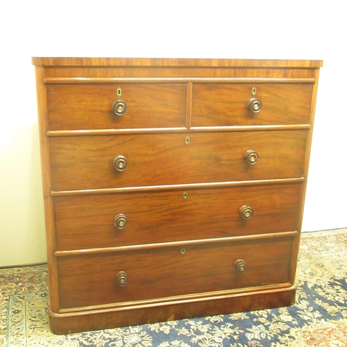 316 - Victorian mahogany chest of two short and three long drawers, with turned wooden handles on a skirte... 