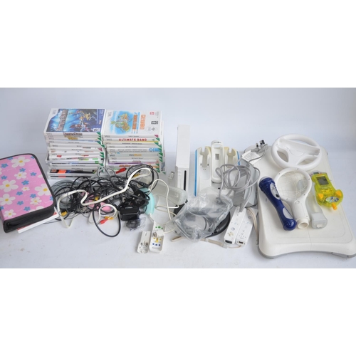 652 - Nintendo Wii (white edition) with accessories, dance board etc.  and a collection of Games incl. Mar... 