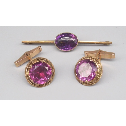 861 - Pair of rose metal cufflinks set with circular purple stone, with foreign hallmark, and an unmarked ... 