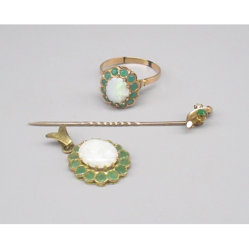 865 - 14ct yellow gold cluster pendant, set with opal and emeralds, a similar yellow metal ring with worn ... 