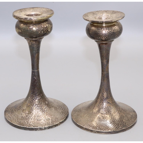 139 - Near pair of Geo. V silver Arts & Crafts candlesticks, hammered finish, one by S Blanckensee & Son L... 