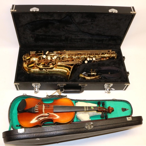 148 - Espirit by Fairfield Saxophone and a violin, both cased (2)