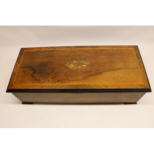 173 - Late C19th walnut Swiss cylinder music box, inlaid and printed top opening to reveal ebonised interi... 