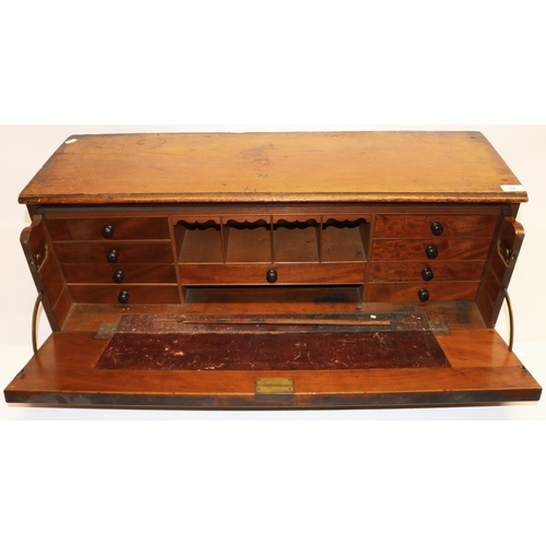 184 - C19th mahogany campaign type bureau with fall front opening to reveal fitted interior with 4 central... 