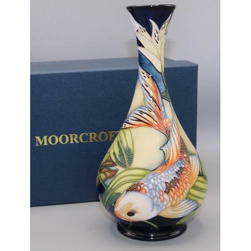 Moorcroft Pottery: Quiet Waters pattern vase decorated with koi carp, dated 2002, H23cm, with box