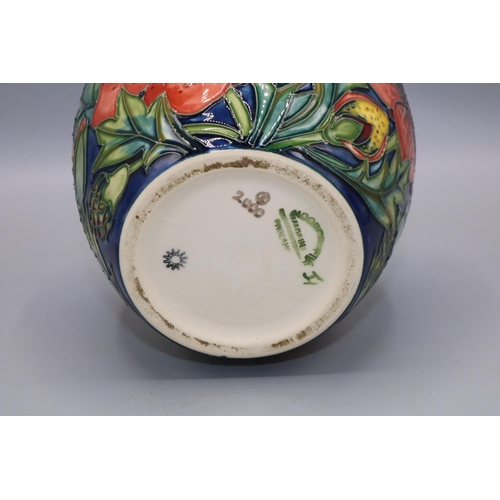 209 - Moorcroft Pottery: ginger jar and cover, decorated with red flowers on a cream ground, dated 2000, H... 