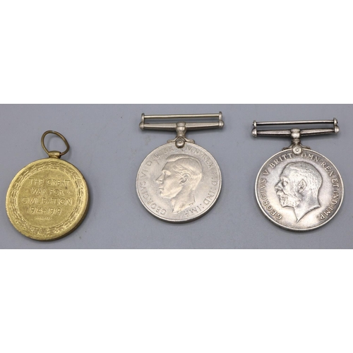 772B - Two standard issue WWI medals for 33745 Pte. Anderson K.S.L.I., and a WWII Defence Medal (3)