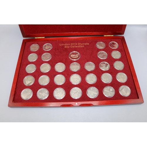 877 - London 2012 Olympic 50p Collection (30), in plastic capsules and display case, majority from circula... 