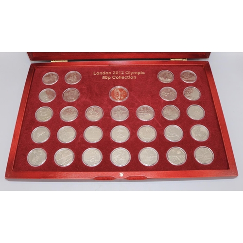 878 - London 2012 Olympic 50p Collection (30), in plastic capsules and display case, all from circulation,... 