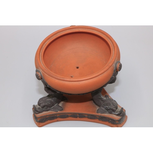 891 - Wedgwood Rosso Antico pastille burner, tripod base with dolphin supports, lacking cover, H8.5cm