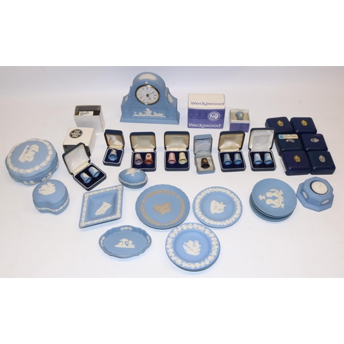 892 - Large quantity of Wedgwood jasperware items, incl. mantle clock, thimbles, pin dishes, etc.