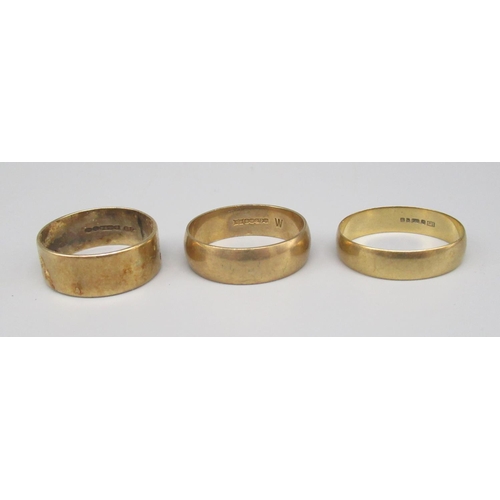 684 - Three 9ct yellow gold band rings, all stamped 375, sizes S1/2, W, W1/2, gross 11.7g