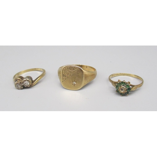 687 - 9ct yellow gold signet ring set with diamond, size W, a crossover diamond ring, size M1/2, and a gre... 