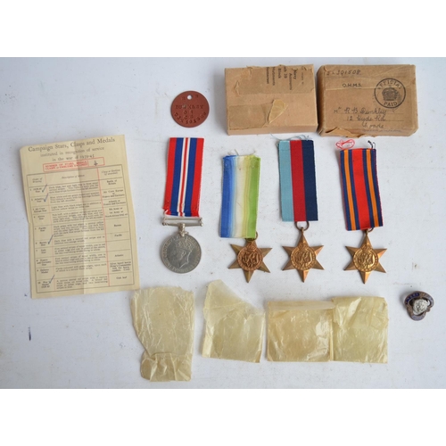 696 - Collection of World War II medals to R.B.Dunkley to include 1939-45 Star, Atlantic Star, Burma Star ... 