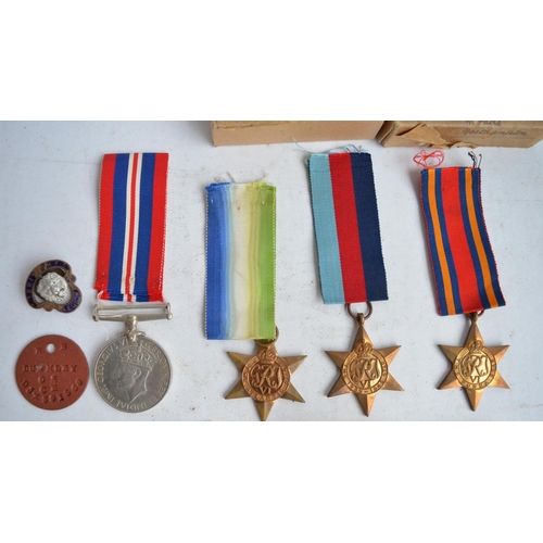 696 - Collection of World War II medals to R.B.Dunkley to include 1939-45 Star, Atlantic Star, Burma Star ... 