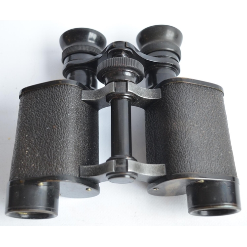 700 - Pair of vintage Jules Huet binoculars with cowhide case, a camera by Ensign, a glass, steel and half... 