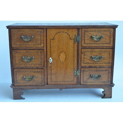 707 - Attractive small inlaid oak cabinet, W47.2xD18.8xH33.4cm