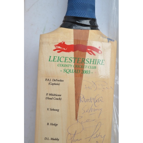 709 - Signed 2003 Leicestershire County Cricket Squad bat to include P. DeFreitas etc, a novelty hinged cr... 