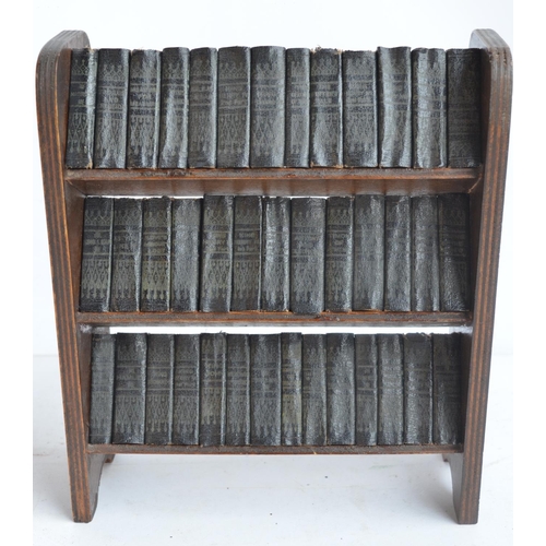 710 - 40 volume miniature set of Shakespeare's works, Allied Newspaper Ltd with original wooden bookcase a... 