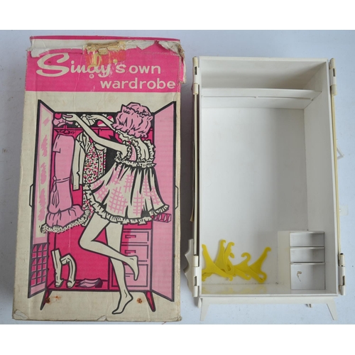 712 - Collection of Sindy accessories to include wardrobe, bed, bath and dressing table. Also a vintage Me... 