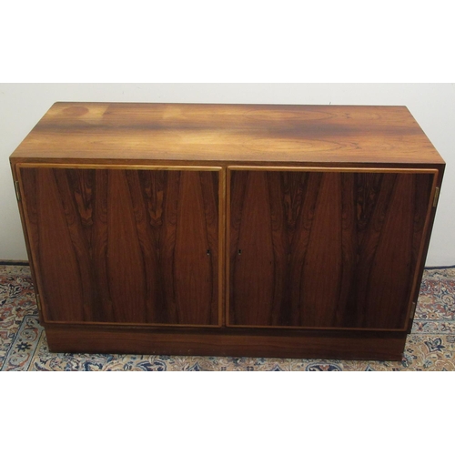 176 - 1960's Danish two-door side cabinet, and a pair of single door cabinets, all with fitted interiors, ... 