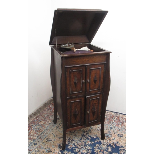 181 - C20th oak cabinet Gramophone with four doors, a collection of 78rpm records and three needle cases