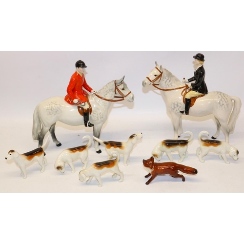 187 - Beswick hunting group, comprising Huntsman No. 1501 and Huntswoman No. 1730 on dapple greys, six hou... 