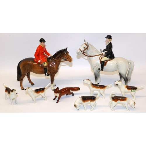 189 - Beswick hunting group, comprising Huntsman No. 1501 on bay/brown, Huntswoman No. 1730 on dapple grey... 