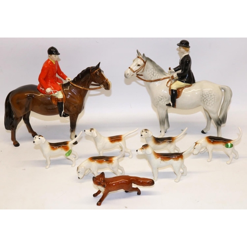 198 - Beswick hunting group, comprising Huntsman No. 1501 on bay/brown, Huntswoman No. 1730 on dapple grey... 