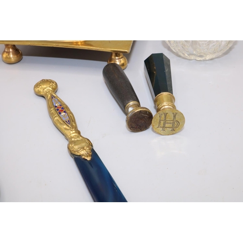 243 - Desk accessories incl. two seals, letter opener with enamel decoration, and a bladed instrument with... 