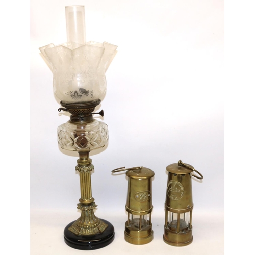 911 - Two reproduction miners lamps incl. one marked Eccles Type 6; and a late C19th/early C20th oil lamp,... 