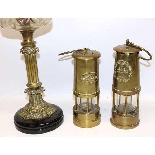 911 - Two reproduction miners lamps incl. one marked Eccles Type 6; and a late C19th/early C20th oil lamp,... 