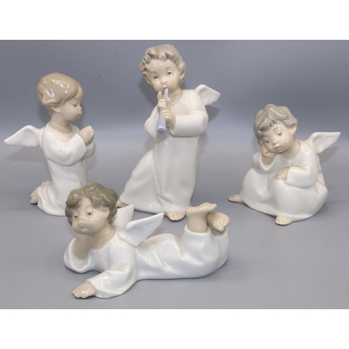 338 - Four Lladro porcelain figures of winged cherubs in various poses (4)