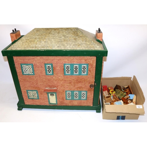 153 - Mid C20th dolls house with tin plate windows and door, L64cm, and a collection of 1950s and later do... 