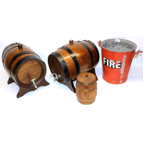 914 - Two coopered oak barrels with taps and stands L35cm, a smaller oak barrel marked 'On loan from J. & ... 