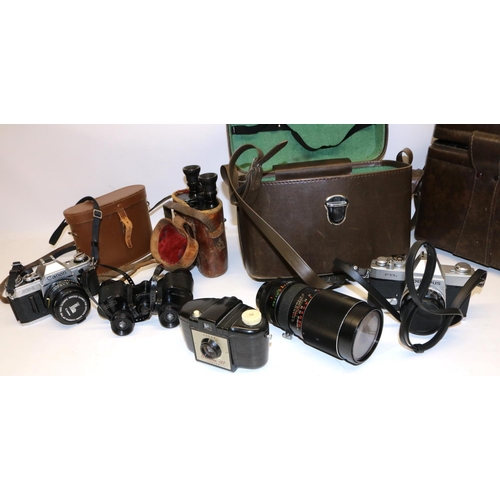 917 - Olympus FTL and Canon AE-1 35mm SLR cameras, Kodak Brownie 127, and two pairs of cased binoculars